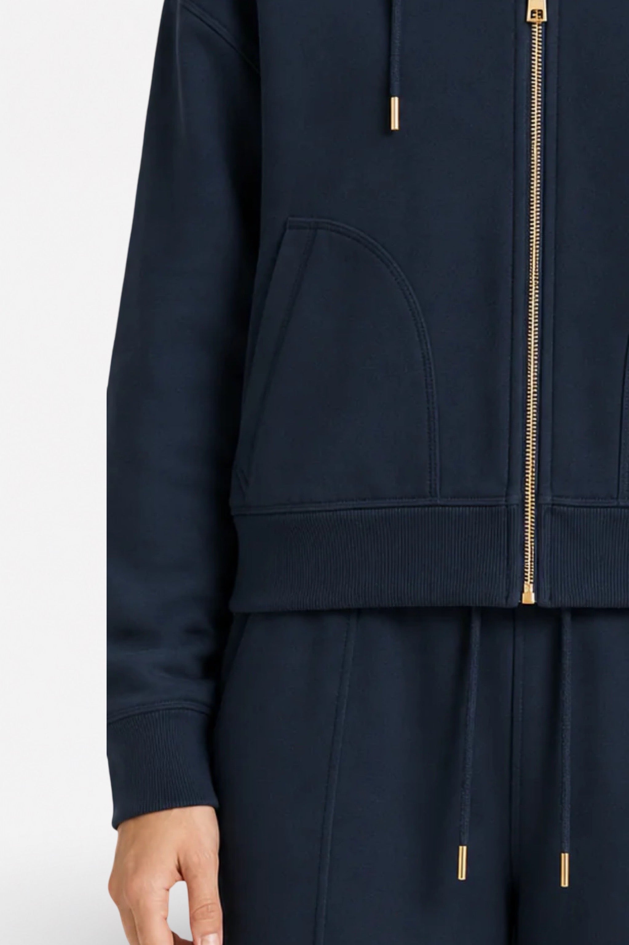 Navy blue Ginaci zip-up hoodie with a hood and slim fit, made of lightweight, soft athletic fabric for comfortable casual wear.