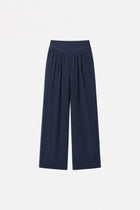 Navy Tencel fabric wide-leg pants with pleats from Ginaci Türkiye, featuring a relaxed fit and stylish design.