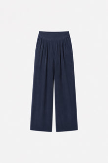 Navy Tencel fabric wide-leg pants with pleats from Ginaci Türkiye, featuring a relaxed fit and stylish design.