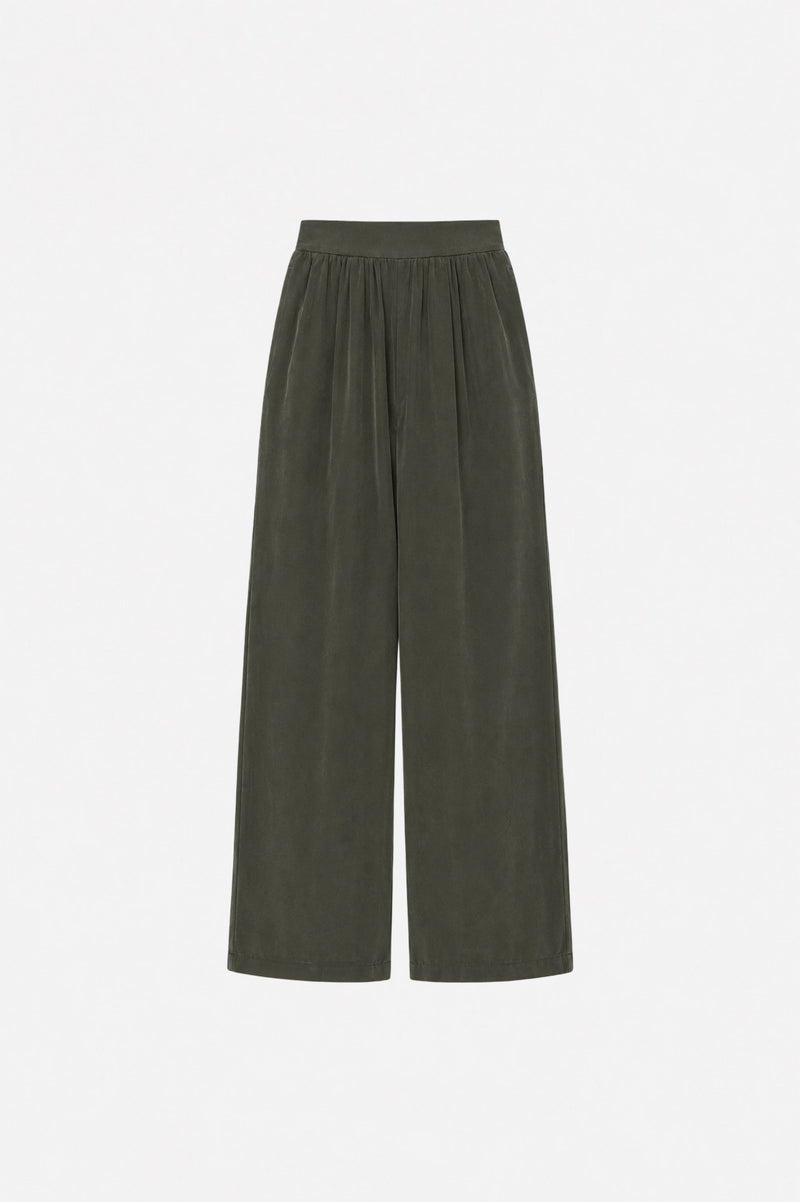 Haki Tencel Kumaş bol paça piliseli pantolon by Ginaci Türkiye displayed on a hanger, showcasing relaxed fit and pleated design.