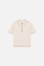 Ecru polo yaka triko sweater from Ginaci Türkiye, showing the soft knit fabric and classic collar on a neutral background.