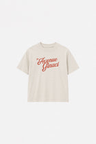 Light beige oversized cotton T-shirt from Ginaci Türkiye, casual fit, soft fabric, displayed on a plain background.