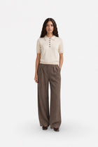 Ecru polo yaka triko sweater by Ginaci Türkiye with a ribbed collar and long sleeves, displayed on a neutral background.