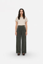Haki Tencel kumaş bol paça piliseli pantolon by Ginaci Türkiye, featuring wide legs and a comfortable, stylish fit.