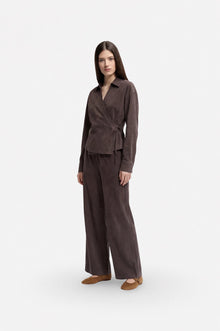 Brown Tencel fabric wrap blouse with V-neck and long sleeves, featuring a tie-front design from Ginaci Türkiye.
