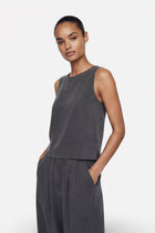 Light gray Ginaci Türkiye Tencel fabric soft touch minimal athletic tank top on a hanger.