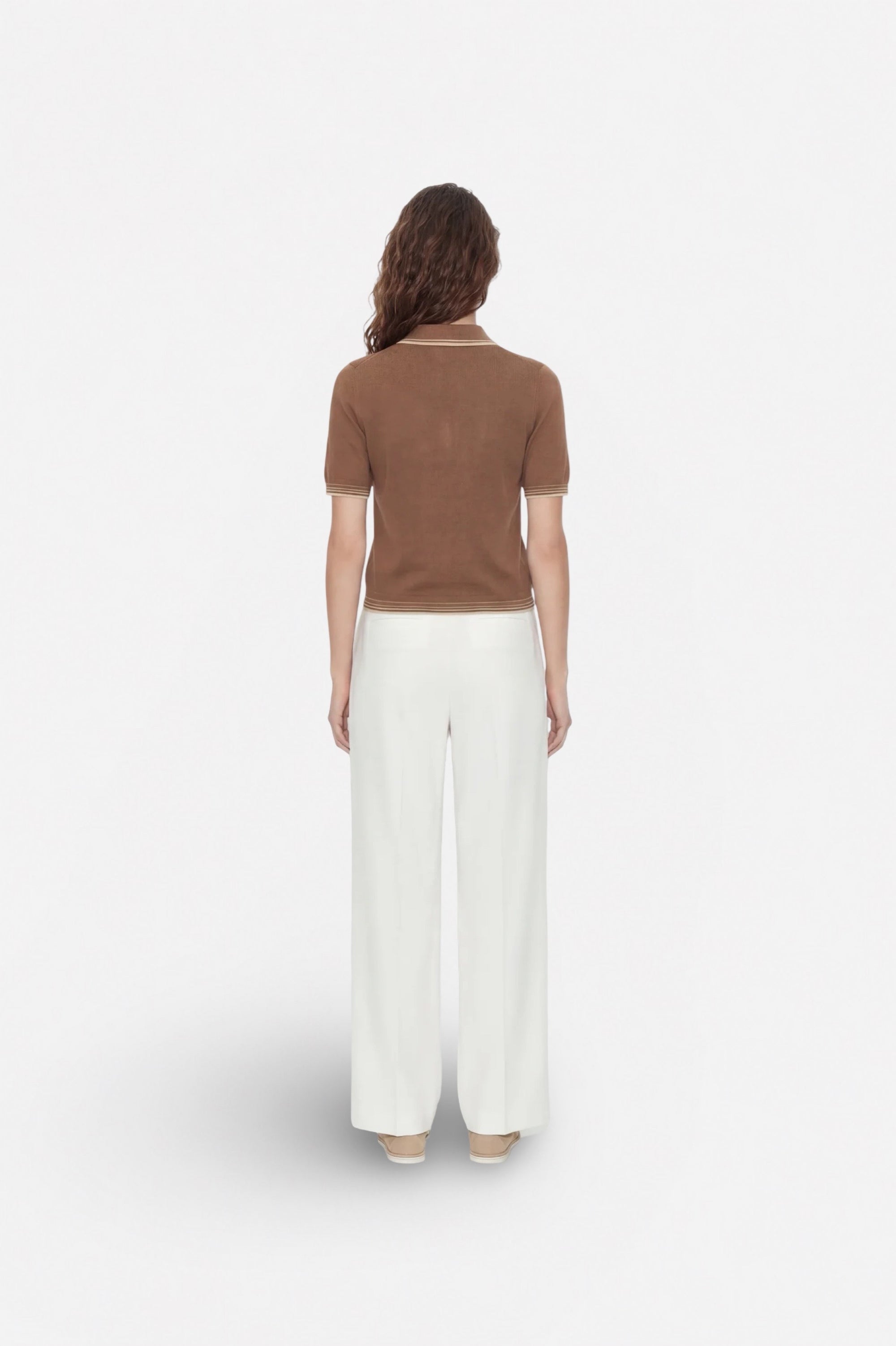 Brown polo neck sweater from Ginaci Türkiye featuring a classic polo collar and knit fabric, displayed on a plain background.