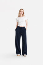 Navy blue stitch-detail sweatpants from Ginaci, featuring a relaxed fit and comfortable fabric for casual wear.