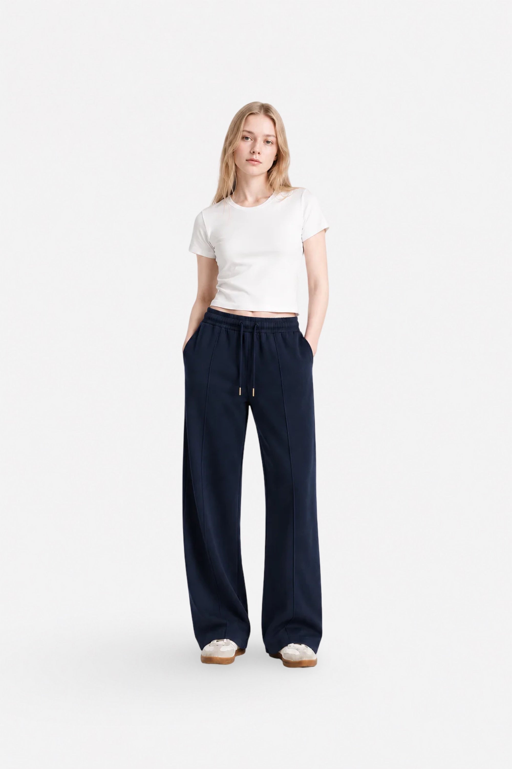 Navy blue stitch-detail sweatpants from Ginaci, featuring a relaxed fit and comfortable fabric for casual wear.