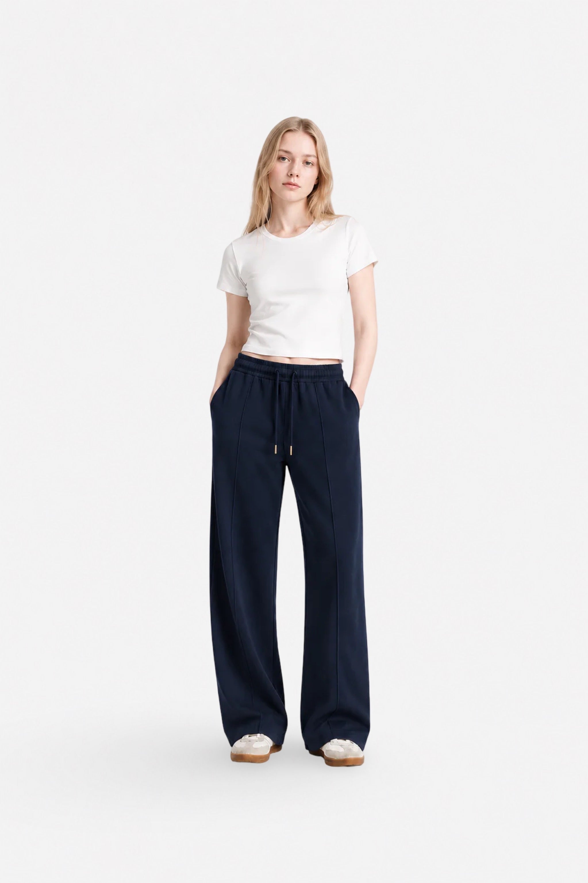 Navy blue stitch-detail sweatpants from Ginaci, featuring a relaxed fit and comfortable fabric for casual wear.