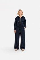 Navy blue zip-up hoodie from Ginaci with a hood and slim fit, made of lightweight, comfortable fabric for casual wear.