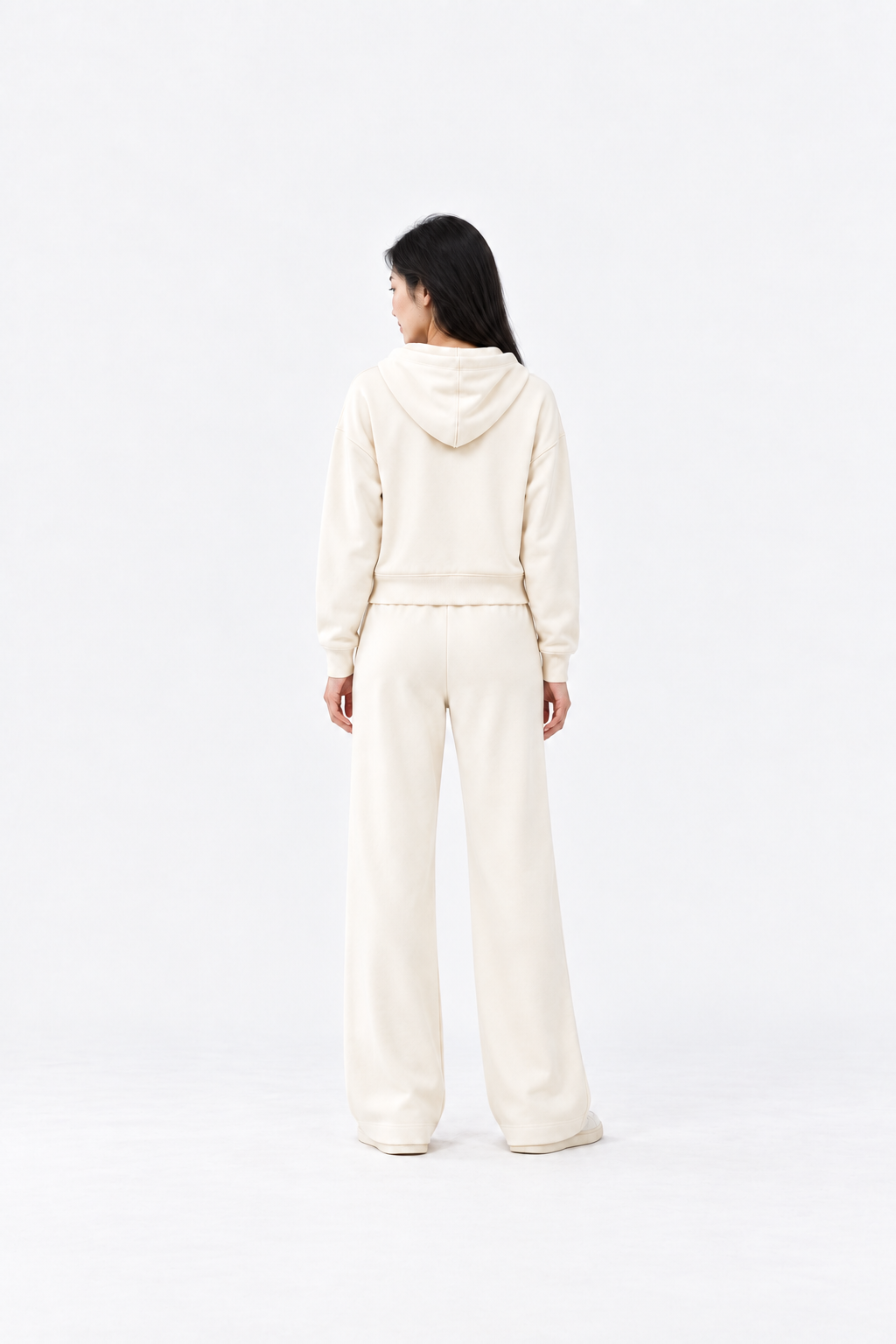 Ginaci ekru fermuarlı kapüşonlu ince eşofman üst, arka view showing lightweight fabric and hood design.