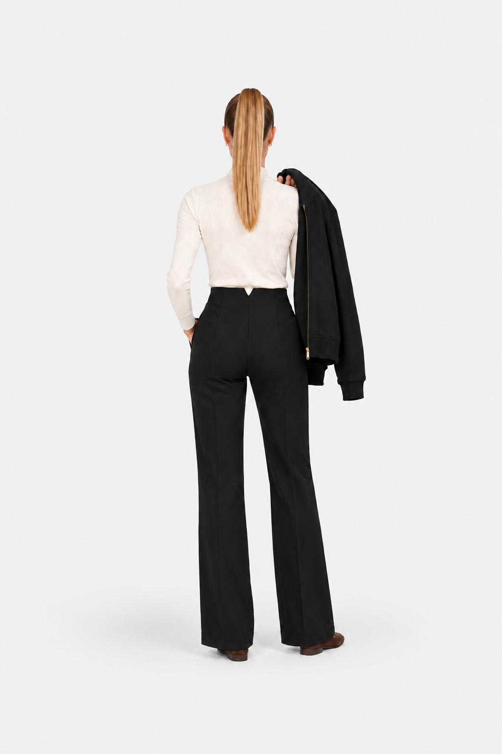 Black high-waisted fit pants from Ginaci, showcasing a sleek sports-chic design with tailored fit and modern style.