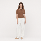Kahverengi polo yaka triko from Ginaci Türkiye featuring a soft knit fabric and a classic polo collar.