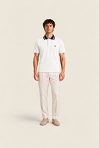 White Pike Polo shirt by Ginaci Türkiye featuring a classic collar and short sleeves, displayed on a plain background.