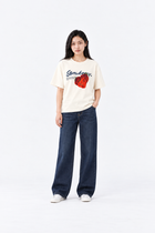 Light beige oversized cotton T-shirt with abstract print from Ginaci Türkiye, showcasing casual and comfortable style.