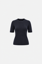 Navy blue polo shirt with round neckline from Ginaci Türkiye, featuring a soft knit fabric and a classic fit.