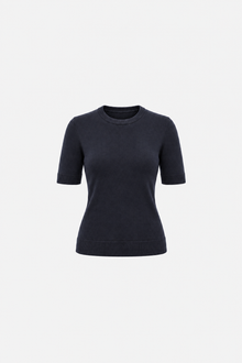 Navy blue polo shirt with round neckline from Ginaci Türkiye, featuring a soft knit fabric and a classic fit.