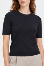 Navy blue polo shirt with round neckline from Ginaci Türkiye, featuring a classic fit and soft knit fabric.