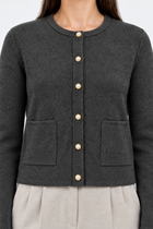 Gri inci düğmeli triko hırka by Ginaci Türkiye, soft knit fabric with button details, styled on a mannequin.
