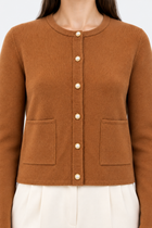 Brown knit cardigan with pearl buttons, stylish and cozy, from Ginaci Türkiye. Perfect for casual and layered outfits.