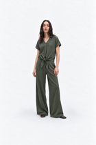 Ginaci Türkiye premium haki Tencel fabric minimal top with tie detail, shown in a profile view.