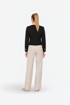 Gold and black tweed blazer from Ginaci featuring gold buttons and classic tailored design.