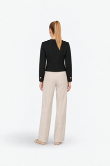 Gold and black tweed blazer from Ginaci featuring gold buttons and classic tailored design.